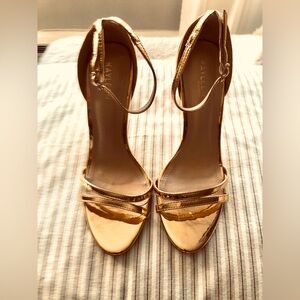 Gold metallic ankle strap heels. Perfect condition.